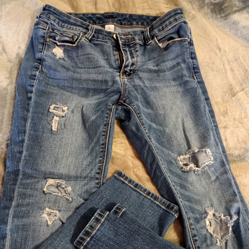 White House Black Market jeans in a size 4 distressed look